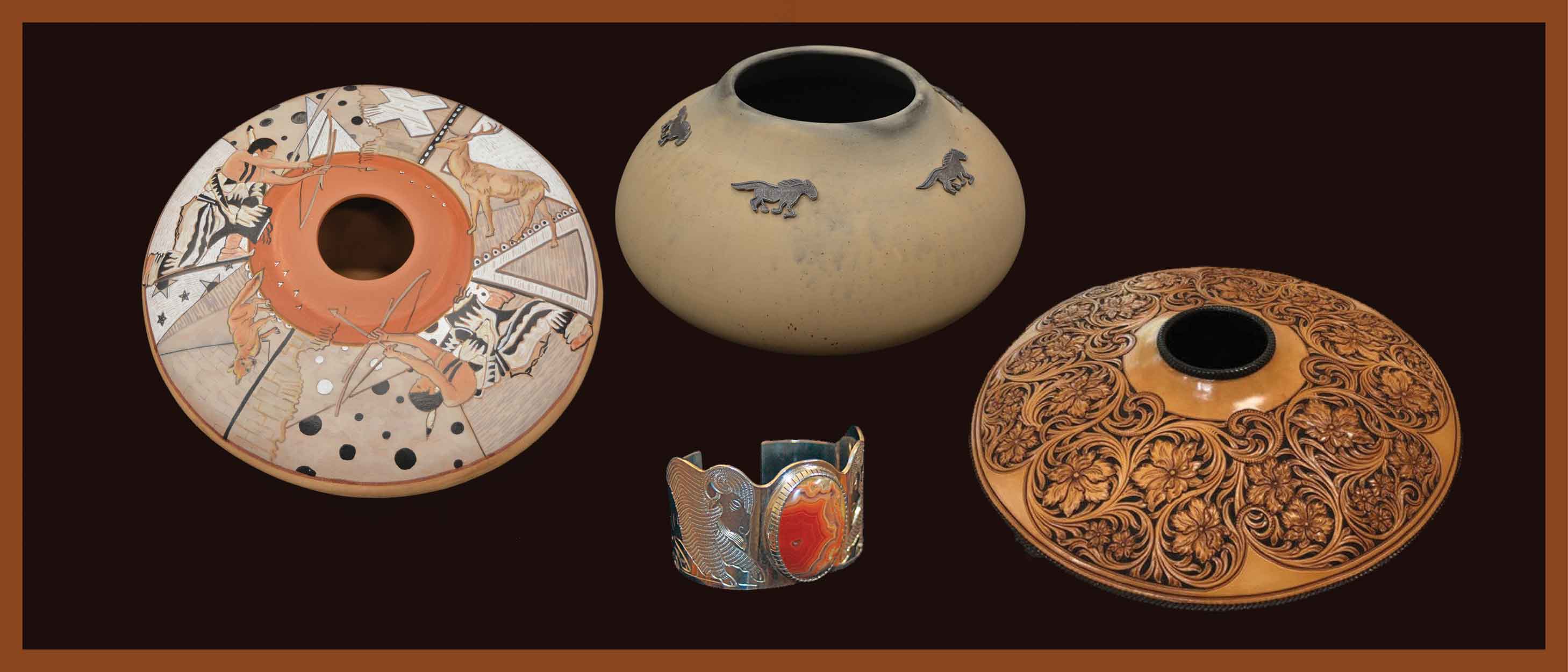 Photo of pottery, a round leather vessel and a silver bracelet with an agate stone.