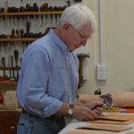 photo of artist and leather carver Jim Jacskon