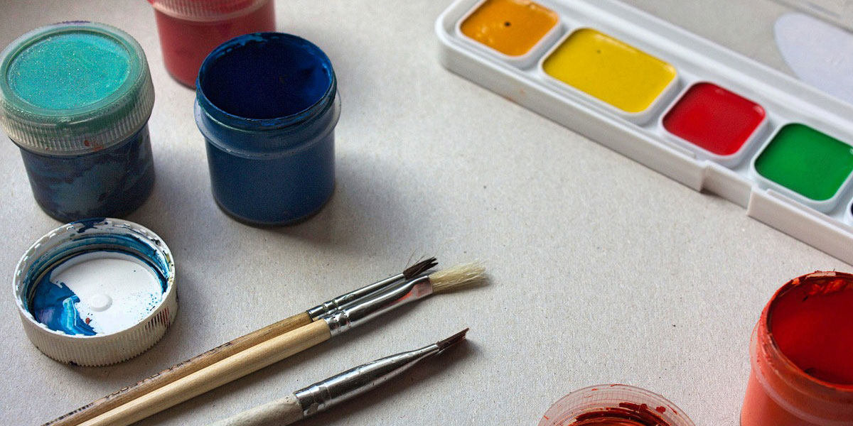 Color photo of paints and paint brushes