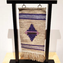 Cheri Shelp, The Beginning, tapestry, cotton, wool, metal, wood display stand