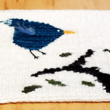 Karen Binder, Landing in 3...2..., tapestry weaving, wool, hand-dyed bird's feather