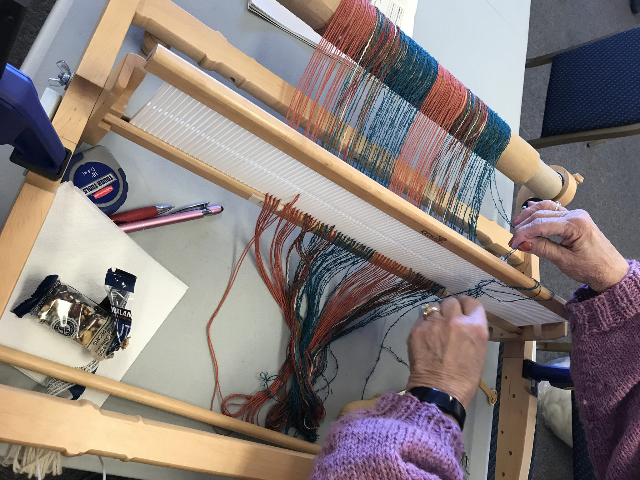 Photo of 4 harness loom weaving in progress-rotate
